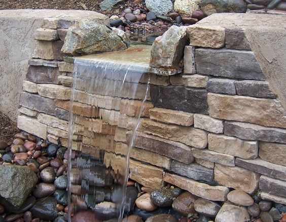 cascadas muro llorón piletas rebose de acero velos de agua